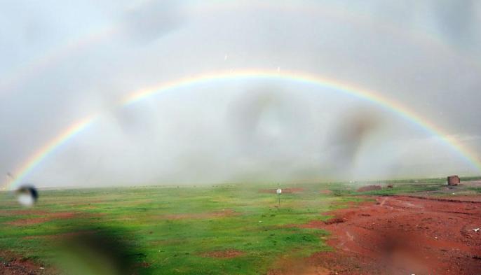 科考隊員在茲格塘錯采樣返程途中，高原風雨彩虹送行?！?lt;a target='_blank' ><p  align=