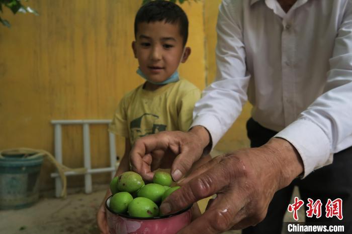 圖為進藏先遣英雄連誓師地原址所在的新疆維吾爾自治區(qū)和田地區(qū)于田縣普魯村現(xiàn)貌?！畛坛?攝