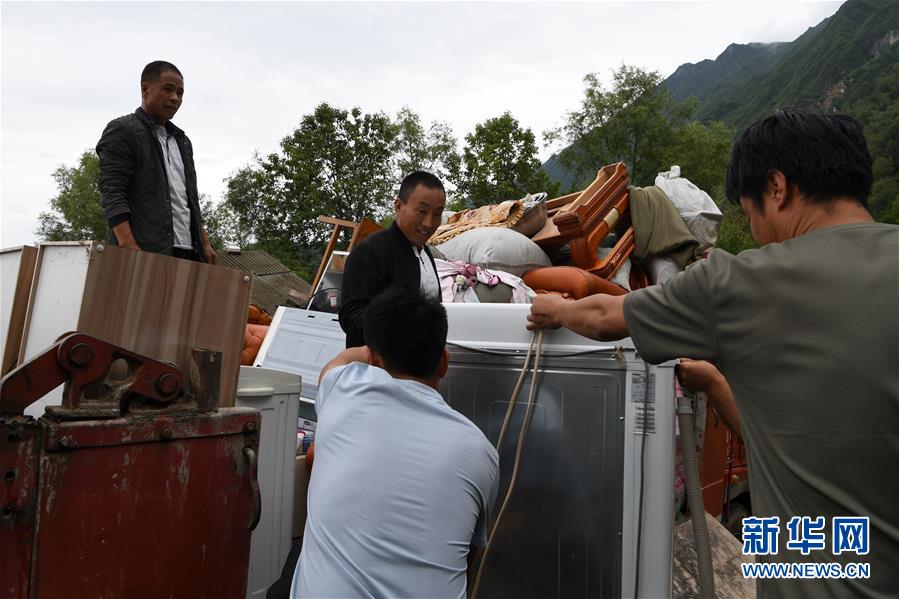 （新華全媒+）（9）千里“挪窩”，踏實開啟新生活