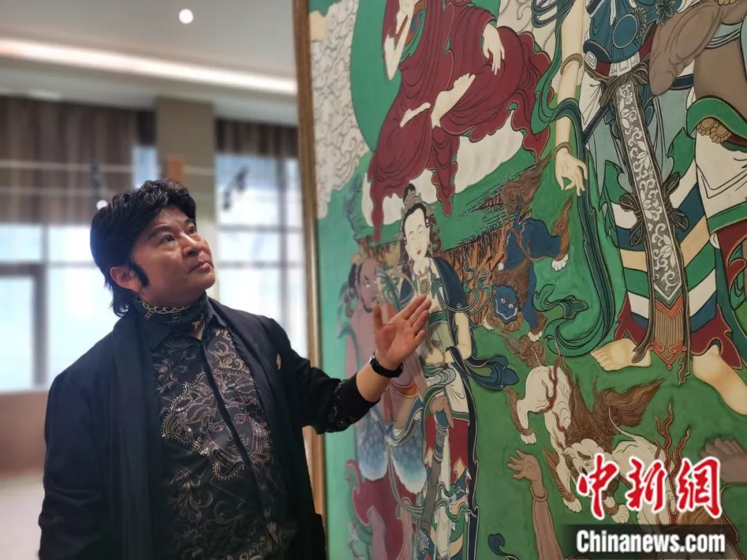 國家一級美術師劉觖。張?zhí)砀?攝